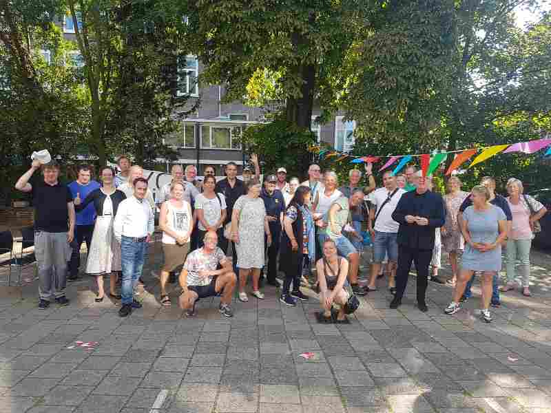 Directeur Elly Burgering beloond met stadsspeld